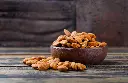 peeled-almonds-clay-plate-stone-tile-wooden-background.webp